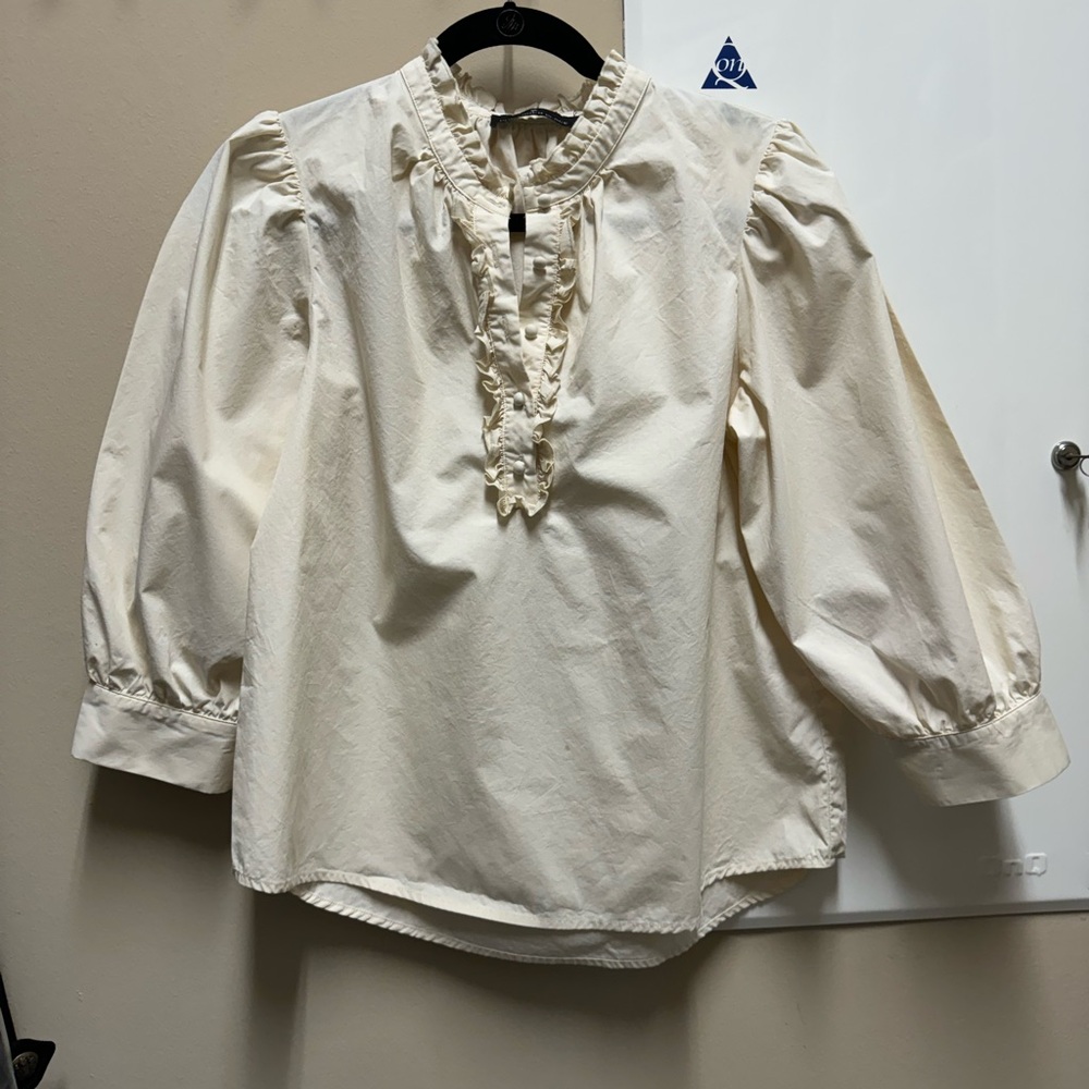 Pomander palace ruffle collar button down